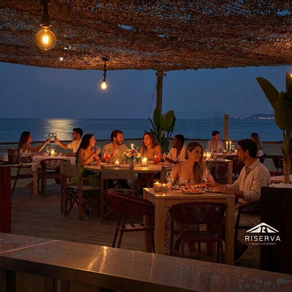 Cena a Riserva con ospiti ai tavoli e vista sul mare